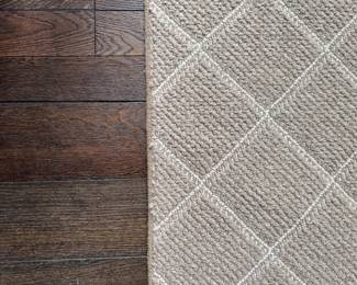 Lewis Home & Carpet Custom Cut Wool Rug. Measures 10' x 15".