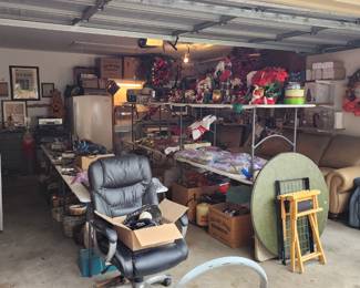 garage is very full, tools, Christmas, furniture and everything else