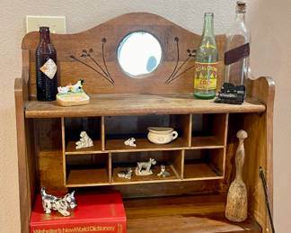 INSIDE OF SECRETARY DESK, OLD BOTTLES, FIGURINES