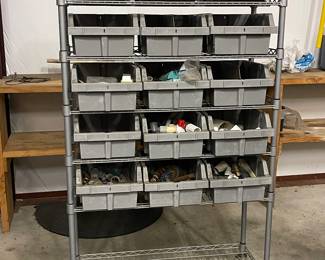 ROLLING RACK WITH PLUMBING SUPPLIES