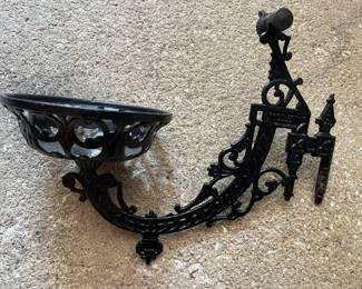 (2) cast iron wall sconces (only one photographed)