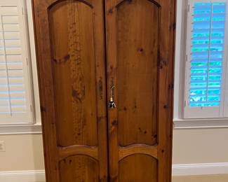 Wooden Armoire with Carved Doors