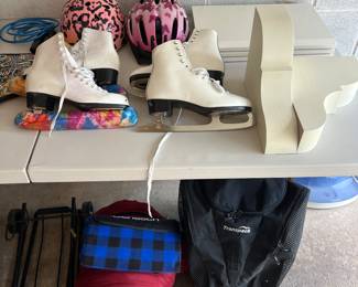 Figure skates, helmets, sleeping bag, sports bag, wooden shelves, two corbels