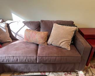 Crate & Barrel Brown Sectional Sofa and assorted throw pillows