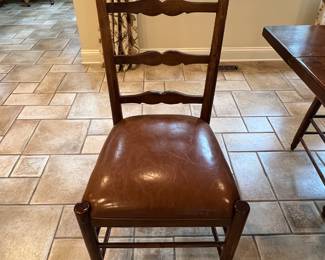 Classic solid wood ladder chair with leather seat.