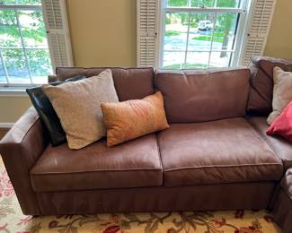 Crate & Barrel Brown Sectional Sofa and assorted throw pillows