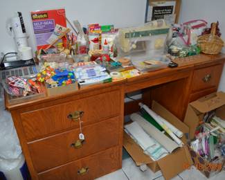 Singer Sewing Machine and cabinet
Sewing supplies