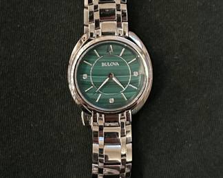 Stainless steel, diamond and malachite face, women's. Extra links included.
