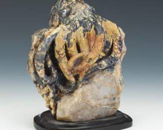Carved Stone Sculpture of an Octopus on Quartz Base