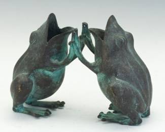 A Patinated Bronze Sculpture of Two Patty Cake Frogs