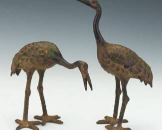 Two Chinese Gilt Cast Iron Storks