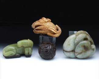 A Group of Four Carved Jade Ornaments