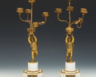 French Empire Pair of dOre Bronze and White Marble FourLight Figural Candelabra, ca. 19th Century