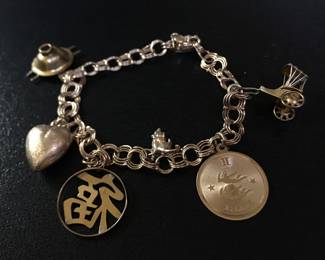 Gold charm bracelet