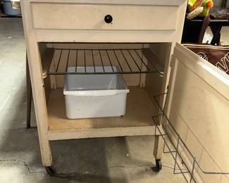  Notice the porcelain top and the wheels 