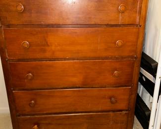 One of several chests of drawers