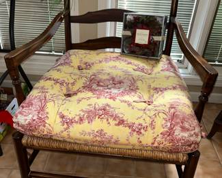 Large dark wood and rush chair