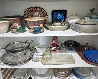 Closet full of serving items.