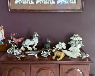 Living room entertainment cabinet & artwork.