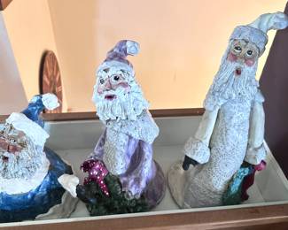 Artisan made ceramic Santa collection.