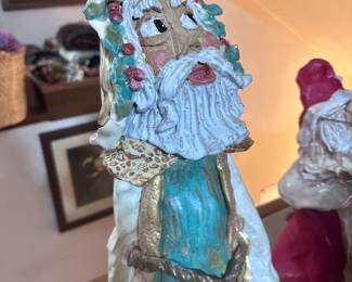 Collection of ceramic Santas.