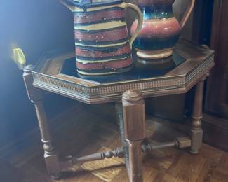 Gallery edge table & ceramic pitchers.