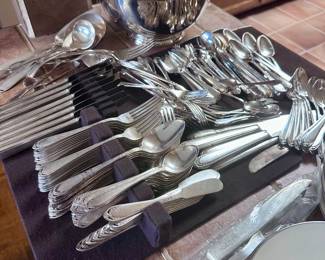 Many pieces of silverware.