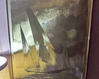Shimmer gold framed wall art.