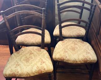 Four antique French chairs.