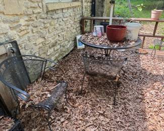 WROUGHT IRON PATIO TABLE AND 4 CHAIRS WITH UMBRELLA