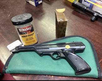 DAISY BB GUN WITH CASE AND BBS AND WILD WEST AFTERSHAVE