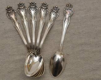 Beautiful antique late 19th century sterling silver spoons. Marked on back with sterling and "Pat. 1893" and engraved with '94; monogrammed on front reads "Ethel"