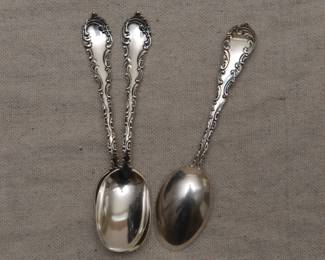 Three matching antique sterling silver spoons