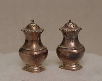 (Before cleaning) A pair of antique silver plated salt and pepper shakers