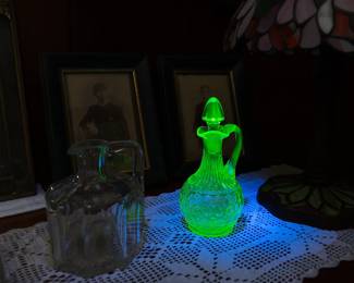 Another view of the vintage vaseline uranium glass "thousand eye" patterned glass stoppered cruet