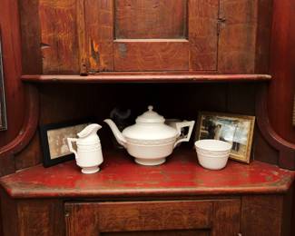 KPM Kurland Berlin porcelain teapot, creamer, and bowl, circa 1900, white porcelain with high glaze finish, relief border with tassels, beads and swags