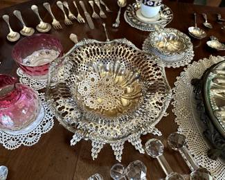 An antique 19th Century sterling silver pierced basket / bowl, silver tea strainer,  antique cut crystal glass knife rests
