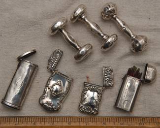 Antique silver baby rattles, and antique silver match safes and 