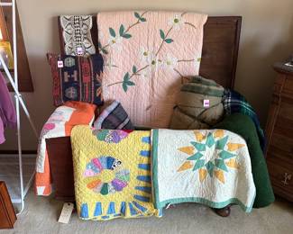 Beautiful antique and vintage quilts, wool blankets, sleeping bags, framed antique photographs, oriental rugs
