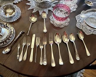 silver spoons, forks, pickle forks, sugar spoons