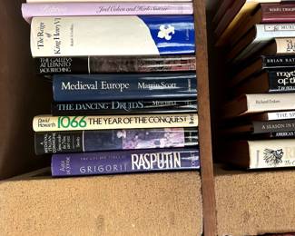 Books including topics such as England history, kings, and early religions; and The Life and Times of Grigori Rasputin by Alex De Jonge