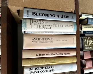 Two shelves of books on Judaism - Authors include Isaac Bashevis Singer, Sylvia Rothschild, David S. Wyman, Chaim Raphael, Gershom Scholem, Albert Shulman, Hayim H. Donin, Abram L. Sachar