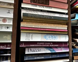 More books available at this estate sale, including "Stained Glass in Thirteenth-Century Burgundy," Medieval Calligraphy," and The Origins and Progress of Writing"