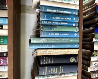 Books including field guides to trees, shrubs, and wildflowers; reptiles and amphibians; and rare birds