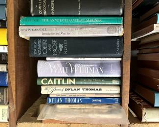 Books including writings of Walt Whitman, Lewis Carroll, Dylan Thomas
