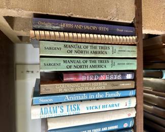 Guide books including Manual of the Trees of North America, Gardening with Herbs for Flavor and Fragrance, Birds Nests
