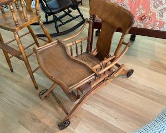 ANTIQUE HIGHCHAIR COLAPSES INTO STROLLER