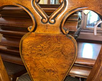 Burl accenting on chair backs