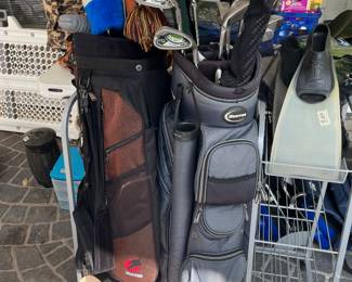 Metal golf rack WITH SOME FINE GOLF CLUBS!