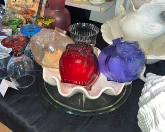 Three colored glass piggy banks